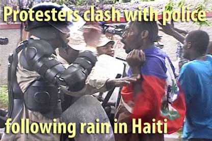 Protesters clash with police following rain in Haiti - February 11, 2010