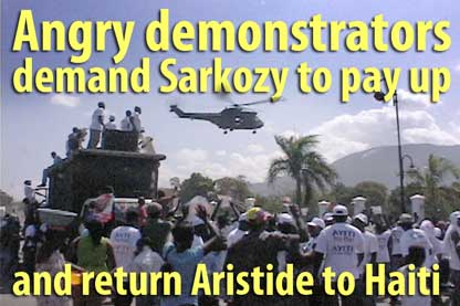Angry demonstrators demand Sarkozy to pay up and return Aristide to Haiti  - February 18, 2010